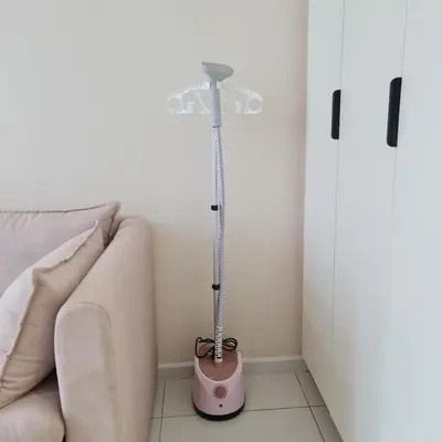 a lamp in a room next to a couch at Majestic Residence Kuala Lumpur City Centre in Kuala Lumpur