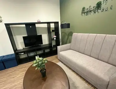a living room with a couch and a table at Setapak Central Mall 2 Bed Zetapark Home Sweet Home in Kuala Lumpur