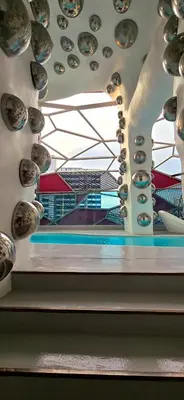 a view of a building with bowls on the wall at KLCC City View Retreat Cozy Spacious Apartment 2BR 2BTH in Kuala Lumpur