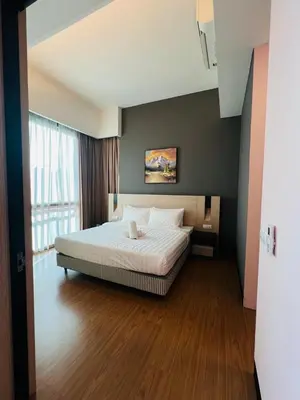 a bedroom with a large bed in a room at Stay Haven at Swiss Garden in Kuala Lumpur