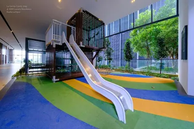 a playground with a slide in a building at Luxe Spacious 2BR Condo KLCC 600mbps Full Furnish in Kuala Lumpur