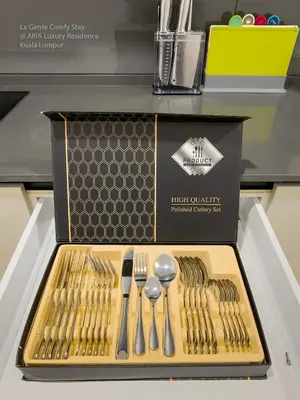 a box of high quality stainless steel cutlery on a shelf at Luxe Spacious 2BR Condo KLCC 600mbps Full Furnish in Kuala Lumpur