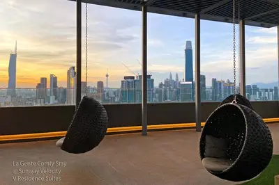 a view of a city skyline from a building at La Gente Comfy Stay 2R2B Velocity - KL City View in Kuala Lumpur