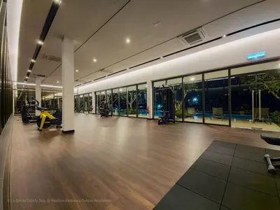 a gym with exercise equipment in a building at 4R3B Luxe KLCC Embassy Pavilion 600MBPS Gas cook in Kuala Lumpur
