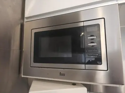 a microwave oven sitting on top of a shelf at M city jalan ampang 5mins to klcc water filter walk to shoplot in Kuala Lumpur