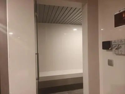 a glass door in a room with a wall at M city jalan ampang 5mins to klcc water filter walk to shoplot in Kuala Lumpur