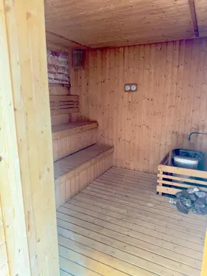 an inside of a sauna with wooden walls and stairs at LUXURY AXON SUITES KLCC PAVILION At BUKIT BINTANG in Kuala Lumpur
