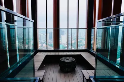 a room with a view of a skyscraper with glass windows at Luxury Suites Lucentia Residence KLCC at BBCC in Kuala Lumpur
