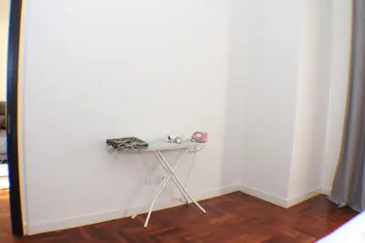 a small table in a room with a mirror at KLCC Sky Villa Suites The Mews in Kuala Lumpur