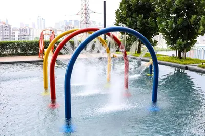 a water park with a bunch of water slides at M Vertica KL City Residences by Vivid Stay in Kuala Lumpur