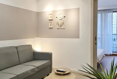 a living room with a couch and a table at Bintang Fairlane Bukit Bintang #121 near Pavilion KLCC Kuala Lumpur in Kuala Lumpur