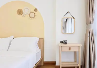 a bedroom with a bed and a mirror and a table at Bintang Fairlane Bukit Bintang #121 near Pavilion KLCC Kuala Lumpur in Kuala Lumpur