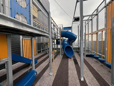 a playground with a blue slide in a building at KLCC Bukit Bintang Anggun Residence 5min walk to Monorail station in Kuala Lumpur