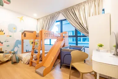 a childs room with a bunk bed and a desk at Blossom Playground with kids friendly home Arte Plus in Kuala Lumpur