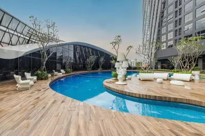 a swimming pool in the middle of a building at up tp 9pax with Slide, Rock Climbing, Arcade, near City & MITEC in Kuala Lumpur