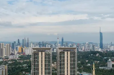 a view of a city with tall buildings at up tp 9pax with Slide, Rock Climbing, Arcade, near City & MITEC in Kuala Lumpur