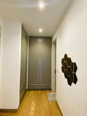 an empty hallway with a door and a wall at Lucentia Residences Bukit Bintang KLCC By LUZBNB in Kuala Lumpur