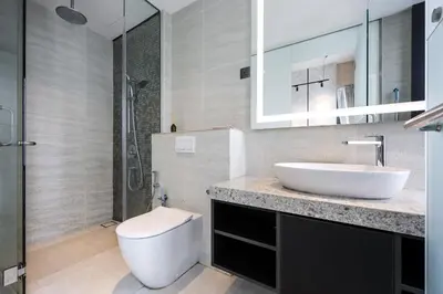 a bathroom with a sink and a toilet at Star Residences By Minos Homestay in Kuala Lumpur