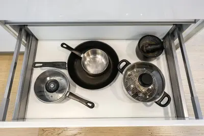 a stove with three pots and pans on it at Star Residences By Minos Homestay in Kuala Lumpur