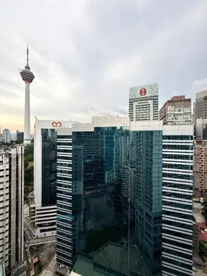 a view of a tall building with a tower at Crystal Suites at Ramad KLCC in Kuala Lumpur