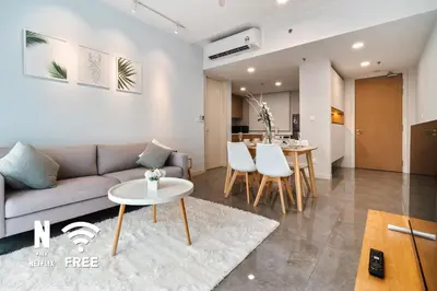 a living room with a couch and a table at Mont Kiara Ooak Suite Sunway 163 with Bathtub 2 Bed in Kuala Lumpur