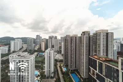 an aerial view of a city with tall buildings at Mont Kiara Ooak Suite Sunway 163 with Bathtub 2 Bed in Kuala Lumpur