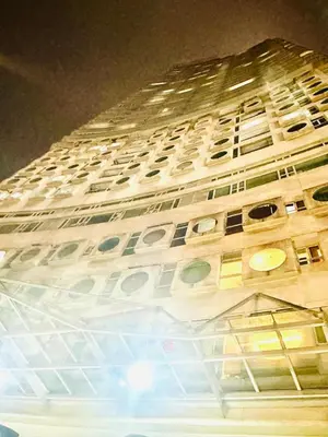 a large white building with lots of windows at Parkview One Bedroom & Two Bedroom apartment klcc in Kuala Lumpur