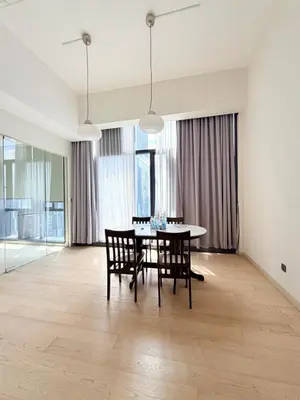 a dining room with a table and chairs at Star klcc by AR Accommodation in Kuala Lumpur