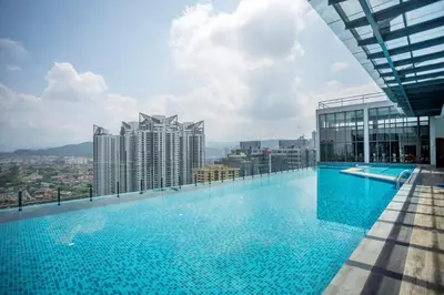 a large swimming pool on top of a building at NOVO Ampang Modern Studio Infinity Pool near KLCC & Gleneagles in Kuala Lumpur