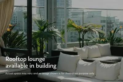 a room with white pillows and plants on a building at Blueground Kuala Lumpur pool nr Lake Gardens KUL-1 in Kuala Lumpur
