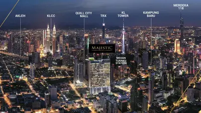 an aerial view of a large city at night at Luxury couple suite Majestic Residence KLCC in Kuala Lumpur