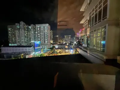 a view of a city at night from a building at Suit Unit at Dua Sentral in Kuala Lumpur