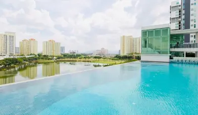 a large swimming pool in a city with buildings at Setapak Central Mall Zetapark Home Sweet Home 2 in Kuala Lumpur