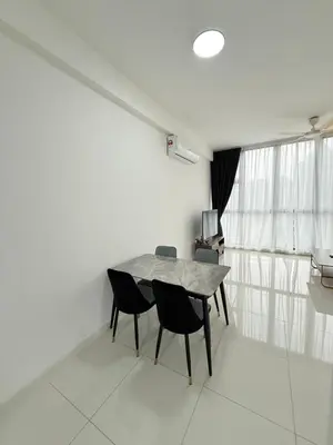 a table and chairs in a white room with a window at Majestic Residence KL in Kuala Lumpur