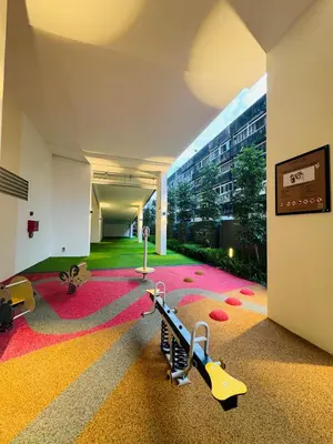 an empty hallway with a room with a building at Majestic Serviced Suites KLCC in Kuala Lumpur