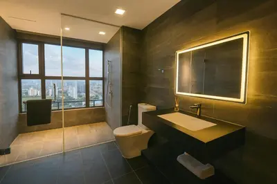a bathroom with a sink and a toilet and a window at Novo Ampang by Dormeo Destinations - Near KLCC and TRX in Kuala Lumpur