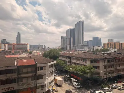 a view of a city with tall buildings and cars at Mykl Family suite Taragon in Kuala Lumpur