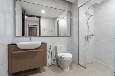 a bathroom with a toilet and a sink and a shower at Prestige 2BR Agile BB WiFi Netflix in Kuala Lumpur