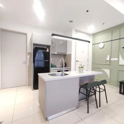 a kitchen with a sink and a refrigerator at TRION The 101 Family Suite Pool & KL City View in Kuala Lumpur