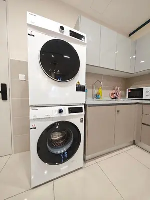 a white washer and dryer in a kitchen at TRION 2BR 6pax Ikea BBCC TRX Velocity KL Base 3KM in Kuala Lumpur