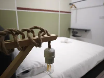 a rope is tied to a bed in a room at TRION 2BR 6pax Ikea BBCC TRX Velocity KL Base 3KM in Kuala Lumpur