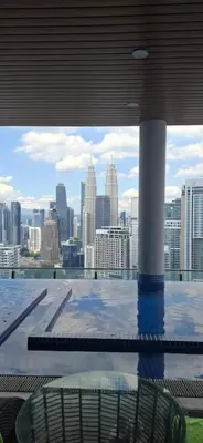 a view of a city skyline from the top of a building at THE COLONY BY INFINITUM by ZENTRIP in Kuala Lumpur