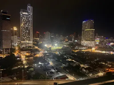 a city lit up at night with buildings at Summer popular suites kl Bukit Bintang in Kuala Lumpur