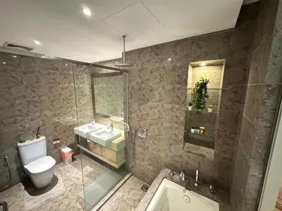 a bathroom with a toilet and a sink and a tub at Dorsett Hartamas, KL City, Bathtub, Rooftop Pool in Kuala Lumpur