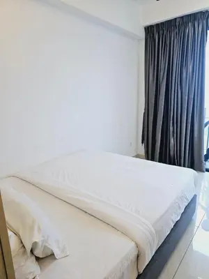 a bed in a bedroom with a window at Colony Infinitum KualaLumpur by FR in Kuala Lumpur