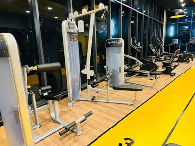 a gym with several rows of tread machines at Neu Suites #2BR Apartment by LammyNora in Kuala Lumpur