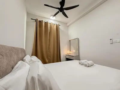 a bedroom with a bed and a ceiling fan at Mountain City View 3BR Condo with Swimming Pool & Free WiFi Netflix in Kuala Lumpur