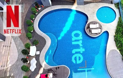 an overhead view of a swimming pool in a city at Arte Plus KLCC Family Studio Apartment Kuala Lumpur in Kuala Lumpur