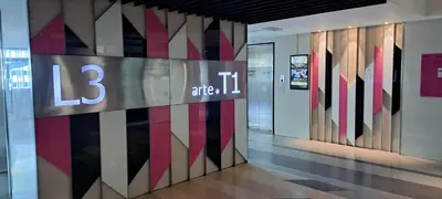 a lobby with a sign on the wall of a building at Arte Plus KLCC Family Studio Apartment Kuala Lumpur in Kuala Lumpur