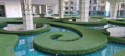 a building with a grassy number in the middle at Arte Plus KLCC Family Studio Apartment Kuala Lumpur in Kuala Lumpur